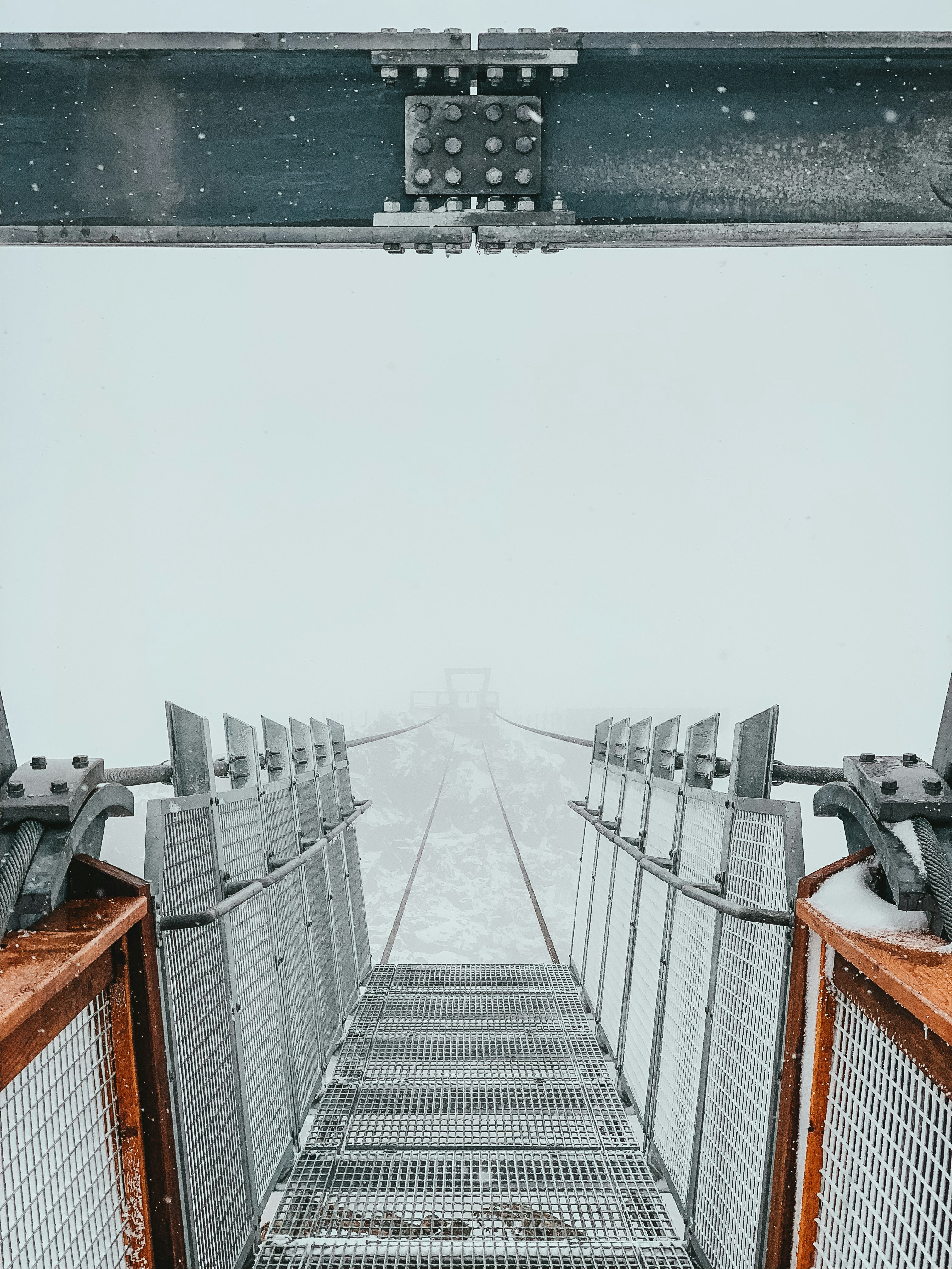 bridge covered in fog